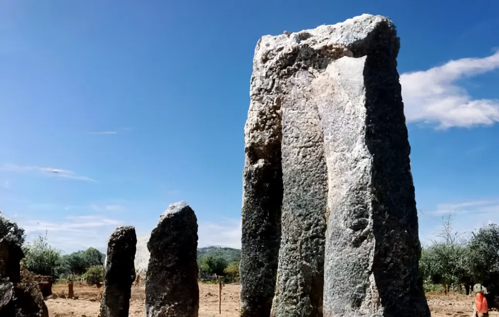 This image is cropped from one generated by Midjourney from "Archaeologists discover one of the largest megalithic sites in Europe on a farm in southern Spain. The site dates back 7,000 years and contains more than 500 standing stones."